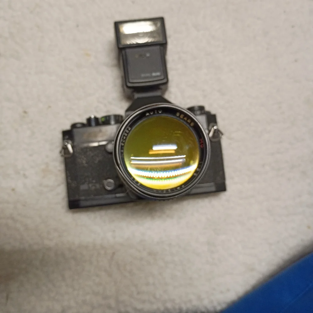 Black KSX Camera with Flash Attachment